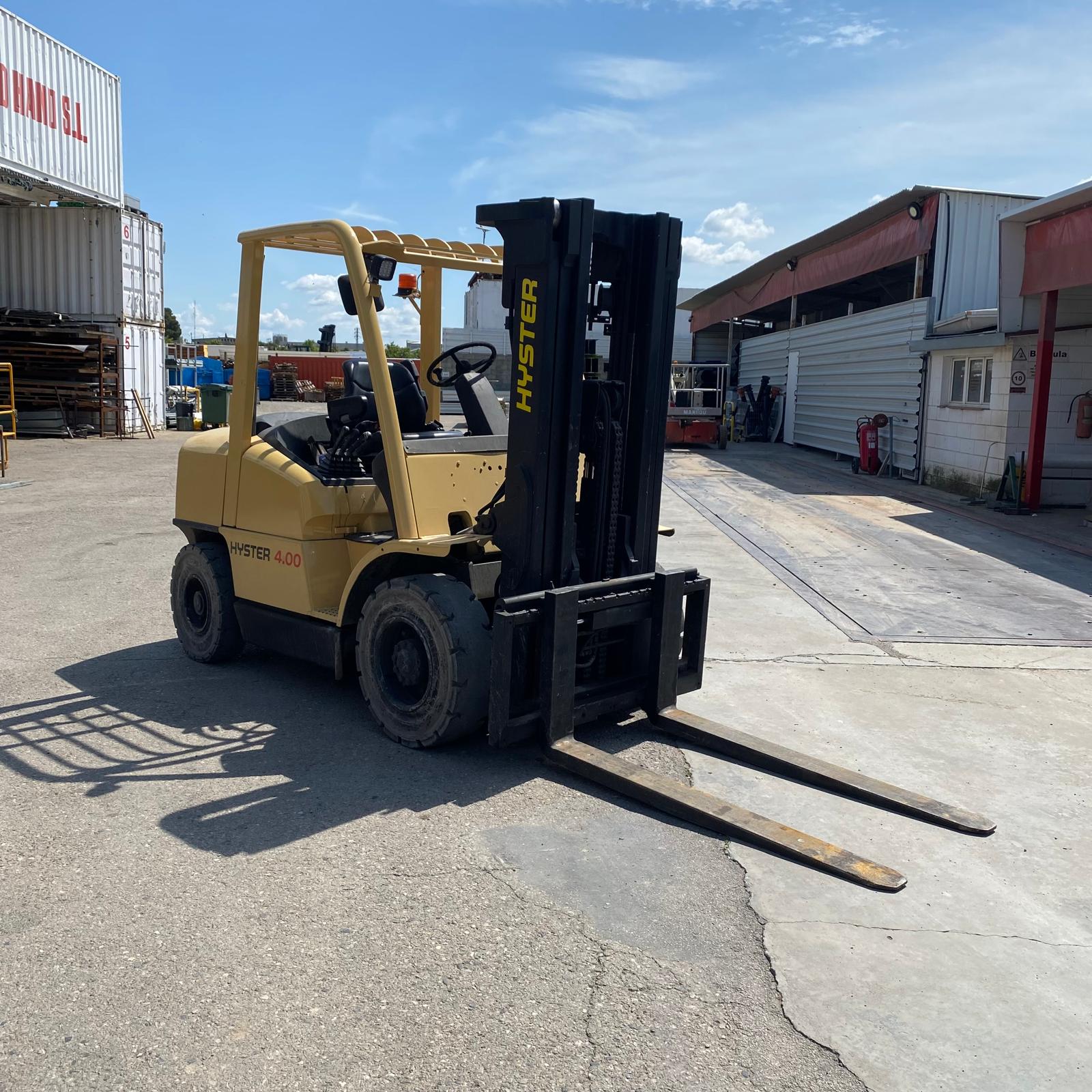 Carretilla elevadora Hyster H4.00XM con horquillas largas y desplazador lateral Bolzoni